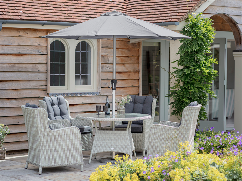 Chedworth Dove Grey Rattan 4 Seat Round Dining Set with Parasol & Base